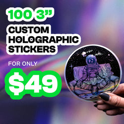Promotional graphic for 100 three-inch custom holographic stickers for forty-nine dollars. A hand holds a round sticker showing an astronaut sitting on a couch in space with planets and stars around. Background shows a holographic gradient. On-image text reads: 100 3-inch custom holographic stickers for only 49 dollars.