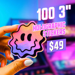 A hand holds a holographic sticker shaped like a wavy-edged smiley face with pink and purple iridescence. The background shows blurred neon arcade lights. On-screen text reads 100 2.5 inch holographic stickers for $29 dollars.