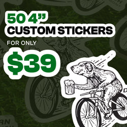 Promotional graphic for 50 custom 4-inch stickers, priced at $39. The design features a black and white sticker of a dog riding a bicycle and holding a mug of beer, set against a dark green background with blurred bicycle graphics.