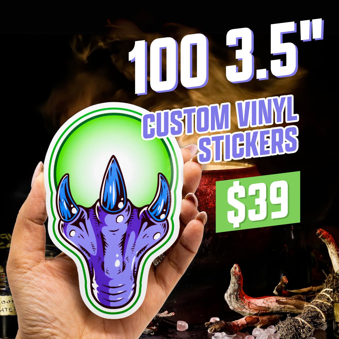 A hand holds a large 3.5-inch custom vinyl sticker featuring a bright green orb with a purple monster claw and sharp blue talons. The background shows smoky, fiery lighting with scattered mystical props. Bold text advertises “100 3.5" Custom Vinyl Stickers” for $39, with a vibrant, eye-catching layout.