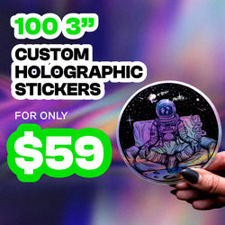 Hand holding a round holographic custom sticker featuring an astronaut sitting in space with stars and cosmic details, reflecting rainbow light. Background shows a colorful iridescent gradient. Promotional text reads 100 3 inch custom holographic stickers for only 59 dollars in bold black and green lettering