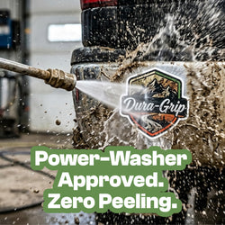 A high-pressure washer sprays a muddy vehicle displaying a custom sticker. Water and mud fly across the scene while the sticker remains securely attached. Text promotes resistance to peeling under demanding outdoor conditions.