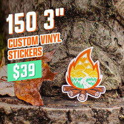 Outdoor promotional graphic featuring a 3 inch campfire sticker with flame mountains trees and log illustrations positioned at the base of a tree trunk. Large text reads 150 3 inch Custom Vinyl Stickers for 39 dollars in orange white and mint green.
