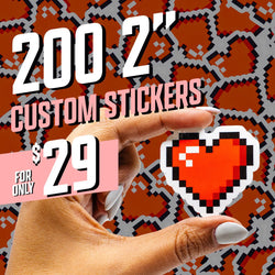 Close-up of a hand holding a small pixel-art style red heart sticker with black and white outline. Background features repeating red pixel heart graphics. Bold white and pink text reads 200 2 inch custom stickers and price 29. Retro gaming inspired visual theme.