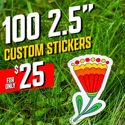 Die-cut vinyl sticker of a tall stylized flower with red, orange, and yellow petals and green leaves, resting on bright green grass. On-image text reads 100 2.5 inch custom stickers for $25. Great for keywords such as floral stickers, retro flower decals, aesthetic plant stickers, and colorful vinyl design