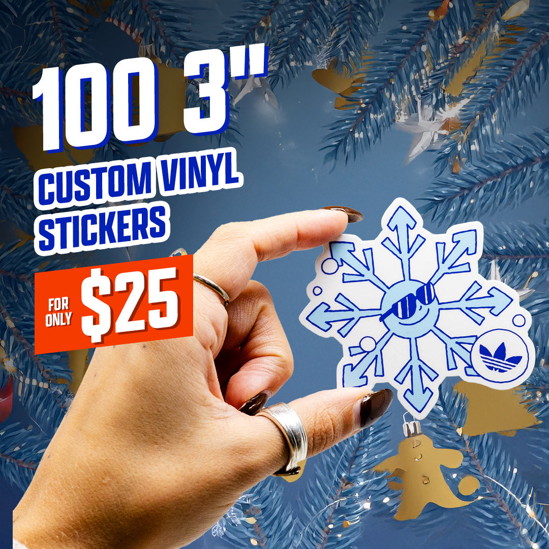 100 3" Custom VInyl Stickers for $25 hand holding snowflake sticker with blue spruce colored pine branches in background re white blue gold