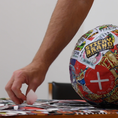 Choosing a sticker to add the world's largest sticker ball