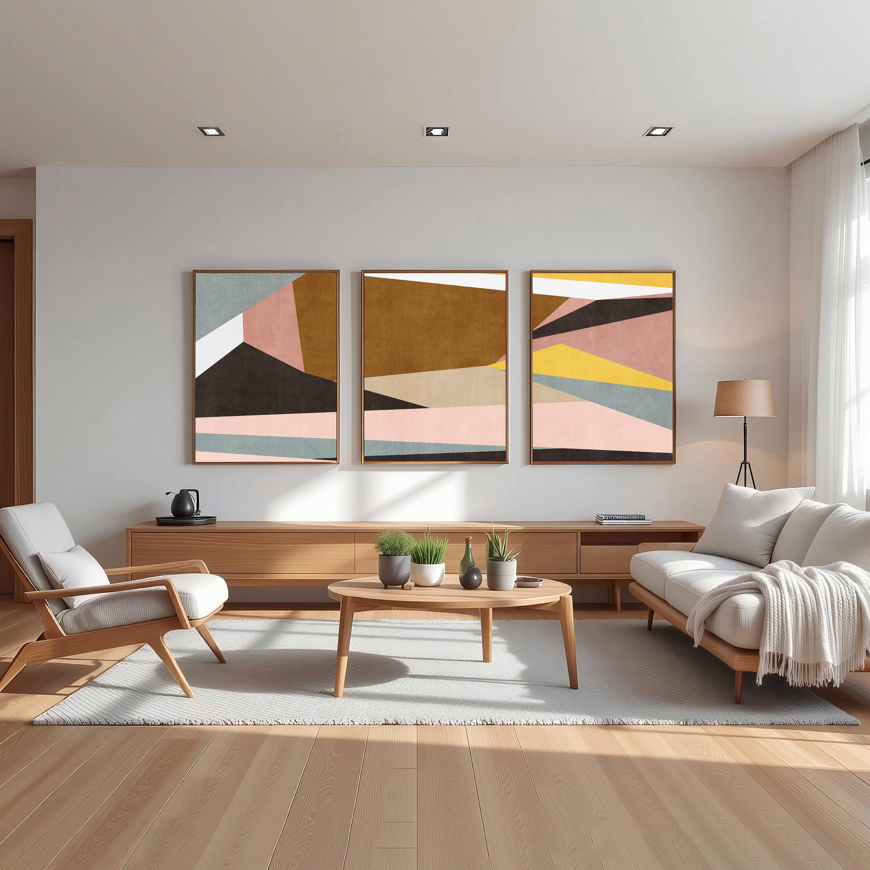 Modern living room with abstract framed canvas wall art, wooden furniture, and decorative elements.