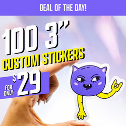 A hand holds a purple cartoon cat sticker with sharp teeth, expressive eyes, and one long yellow arm making a rock-on gesture. Promotional text reads Deal of the Day, 100 3 inch custom stickers for only 29 dollars.