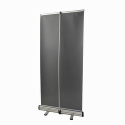 Retractable banner stand extended with banner shown in reverse on white background