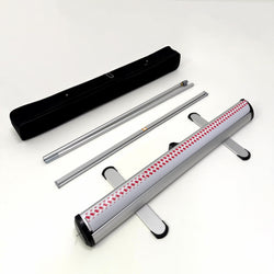 Image shows Banner stand package content black carry case aluminum pole stand and retractable base with protective edge feet