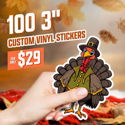 Hand holding a die cut cartoon turkey with pilgrim hat, vest, and bowtie, standing against an autumn leaf background. On-image text 100 3 inch custom vinyl stickers and 29. Keywords: Thanksgiving turkey sticker, holiday character decal, fall vinyl stickers.