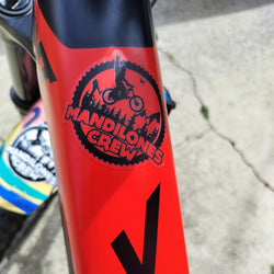 Mandilones Crew Bicycle sticker on a bike frame