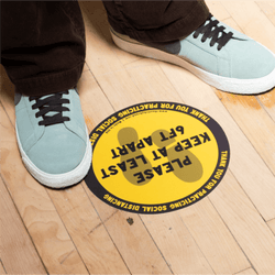 Black and yellow social distancing floor sticker