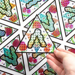 Abstract prismatic holographic stickers with an artistic touch