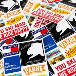 Multiple snowboard sticker decals overlapping each other 