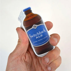 Stack of small brewery stickers - Switchback Ale